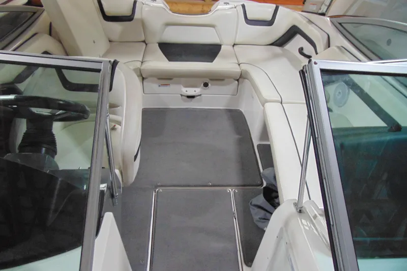 Slide: The Image of 2016 Yamaha Boats AR190 interior with white seating and steering wheel. - 11