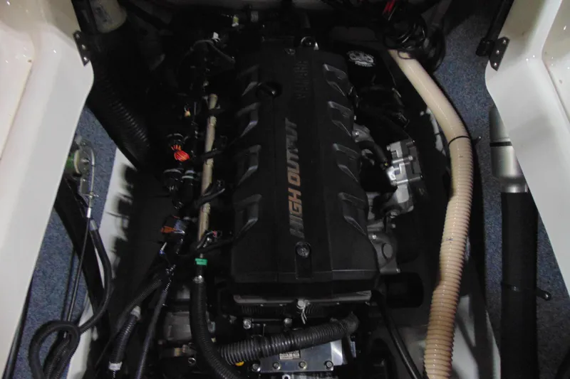 Slide: The Image of Engine compartment of a 2016 Yamaha Boats AR190, showcasing the high output engine. - 12