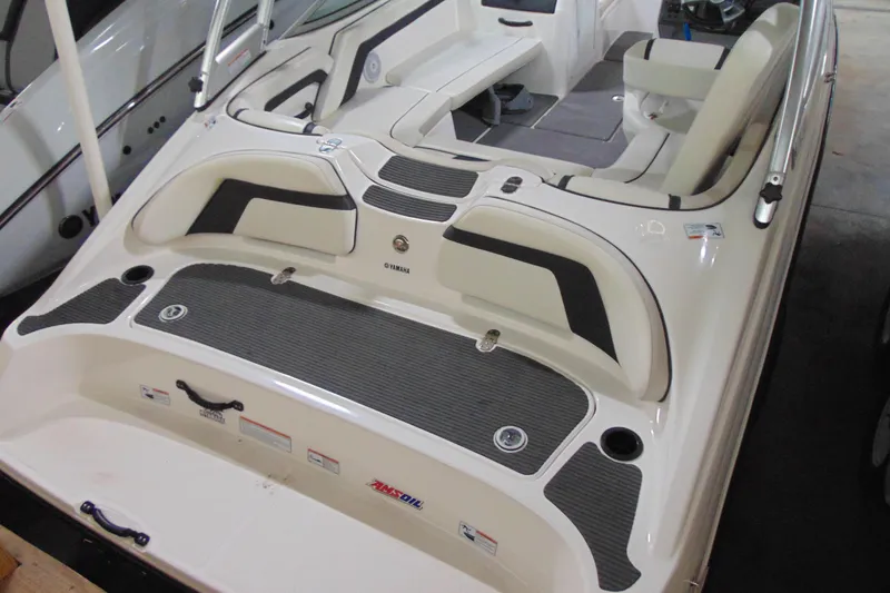 Slide: The Image of 2016 Yamaha Boats AR190 interior with seating and deck details. - 4