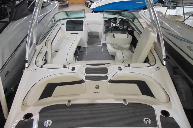 Slide: The Image of 2016 Yamaha Boats AR190 interior view, showcasing seating and steering area. - 5