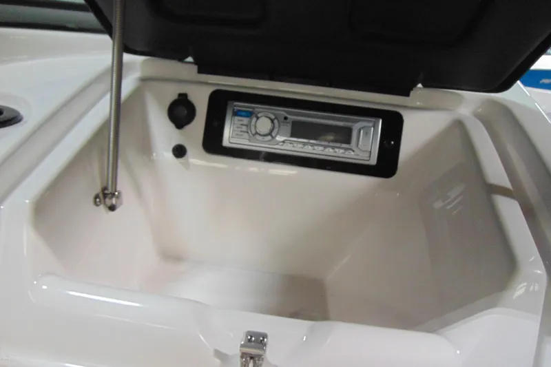 Slide: The Image of 2016 Yamaha AR190 boat storage compartment with audio system. - 9