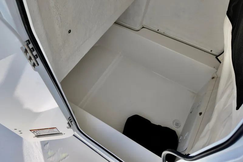 Slide: The Image of Storage compartment of 2026 Sea Fox 228 Commander boat, featuring a clean, spacious interior. - 13