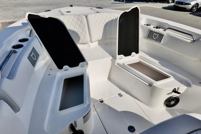 Slide: The Image of 2026 Sea Fox 228 Commander boat interior with open storage compartments. - 15