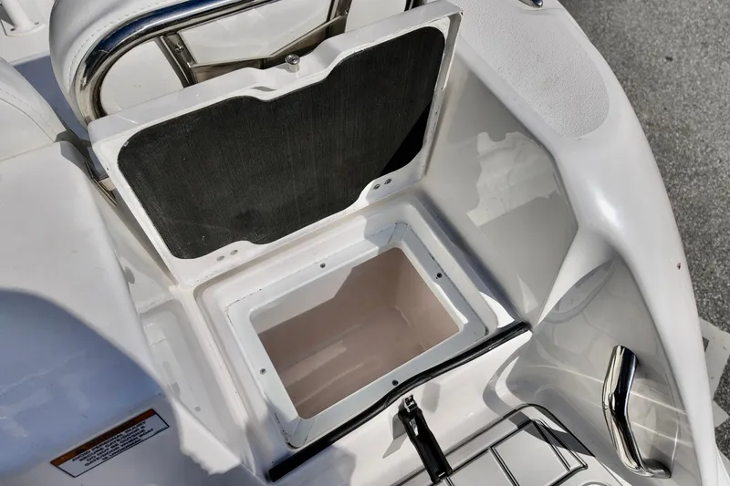 Slide: The Image of Open storage compartment on a 2026 Sea Fox 228 Commander boat. - 17