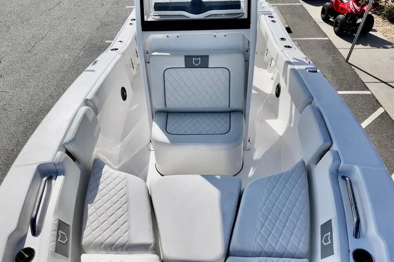 Slide: The Image of 2026 Sea Fox 228 Commander boat interior with cushioned seating and sleek design. - 6