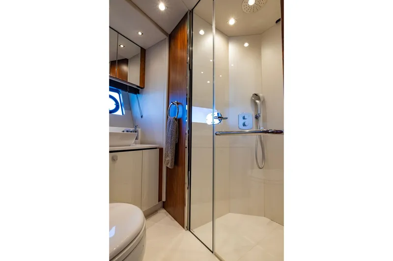 Slide: The Image of Luxurious bathroom in 2020 Sunseeker Predator 74 yacht with modern shower and sleek design. - 35