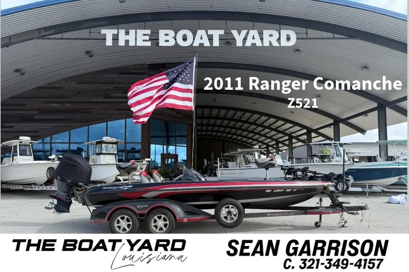The Image of 2011 Ranger 521SVX Comanche boat at The Boat Yard, Louisiana, with American flag. - 0
