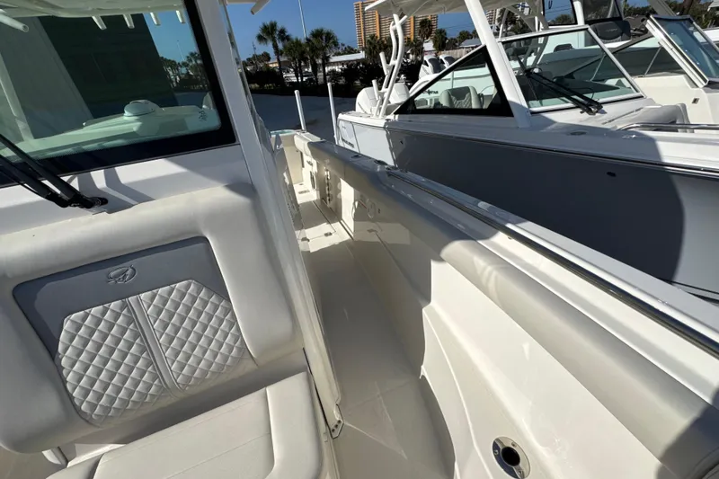 Slide: The Image of 2026 Sailfish 272 CC boat interior with sleek seating and modern design. - 16