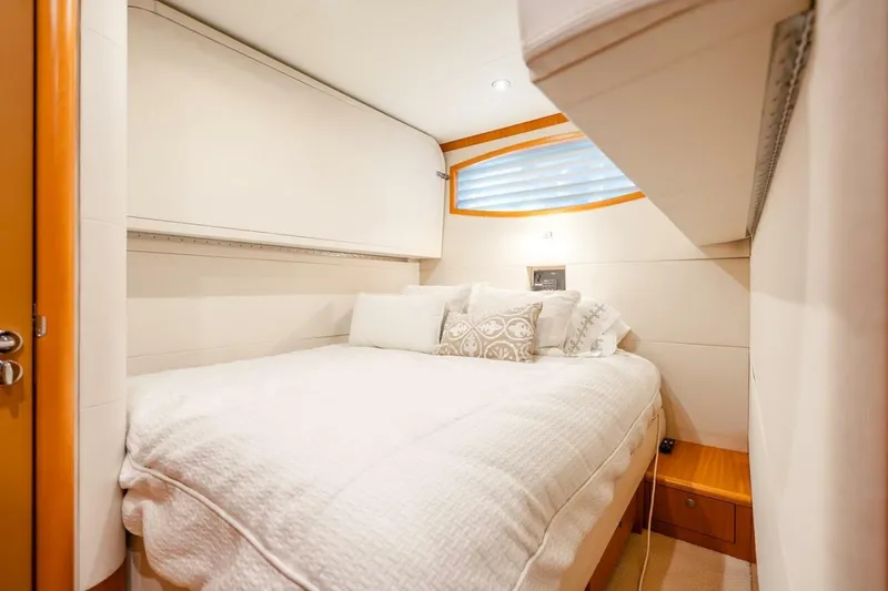 Slide: The Image of Luxurious bedroom interior of 2008 Lazzara Motor Yacht with elegant bedding and soft lighting. - 48