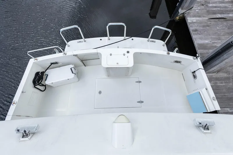 Slide: The Image of 2005 Ocean Alexander Raised Pilothouse Flybridge Sedan, spacious deck view. - 29