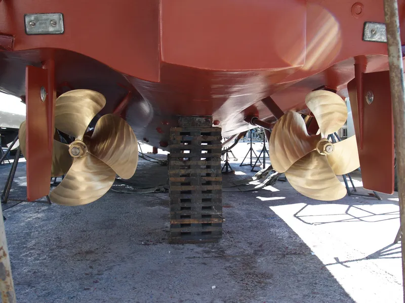 Slide: The Image of 2005 Ocean Alexander yacht propellers and hull on dry dock. - 49