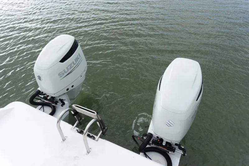 Slide: The Image of Twin Vee 280 STX CC 2026 with Suzuki outboard motors. - 8