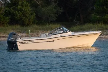 Slide: The Image of Manufacturer Provided Image: 2017 Grady-White Freedom 205 boat cruising on open water with passengers. - 2