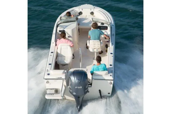 Slide: The Image of Manufacturer Provided Image: 2017 Grady-White Freedom 205 boat cruising on water with passengers. - 5