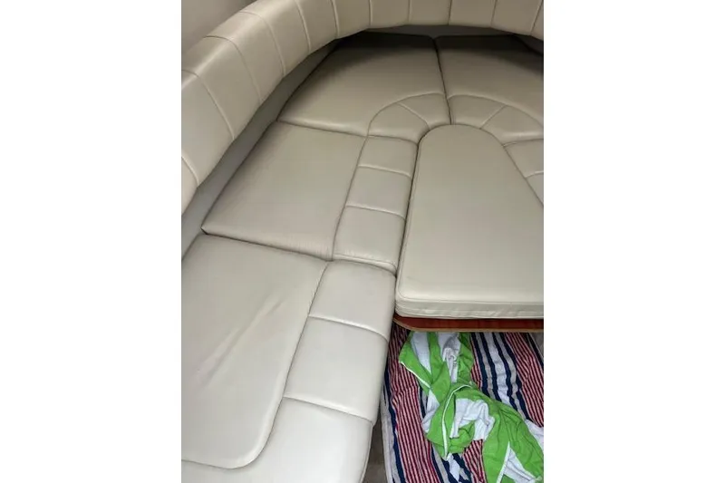 Slide: The Image of Interior cabin of 2004 Formula 26 Performance Cruiser with beige upholstery. - 14