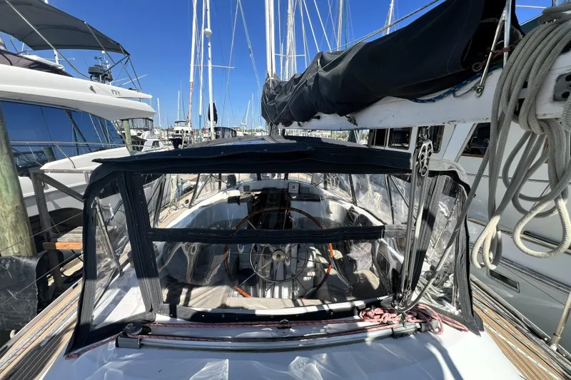 Slide: The Image of Sailboat cockpit view, Pinical 14-34, 1985 model, docked at marina. - 16