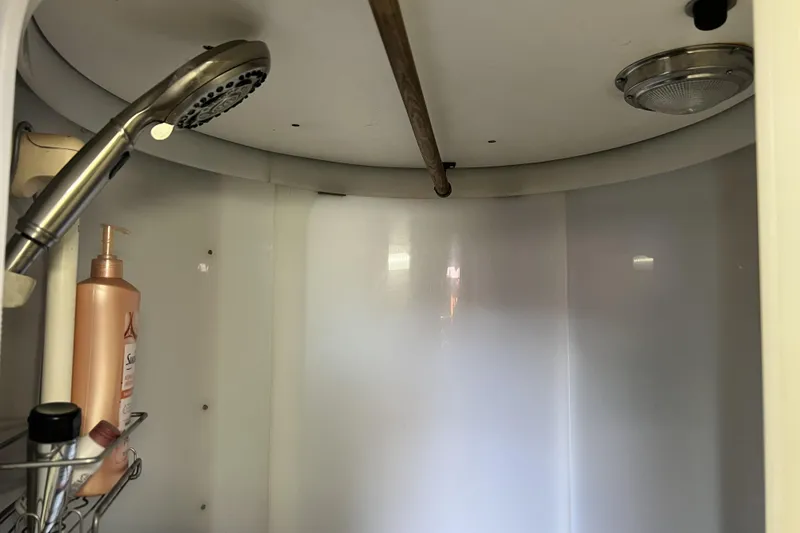 Slide: The Image of Shower interior with handheld showerhead and soap dispenser, Pinical 14-34 model, 1985. - 20