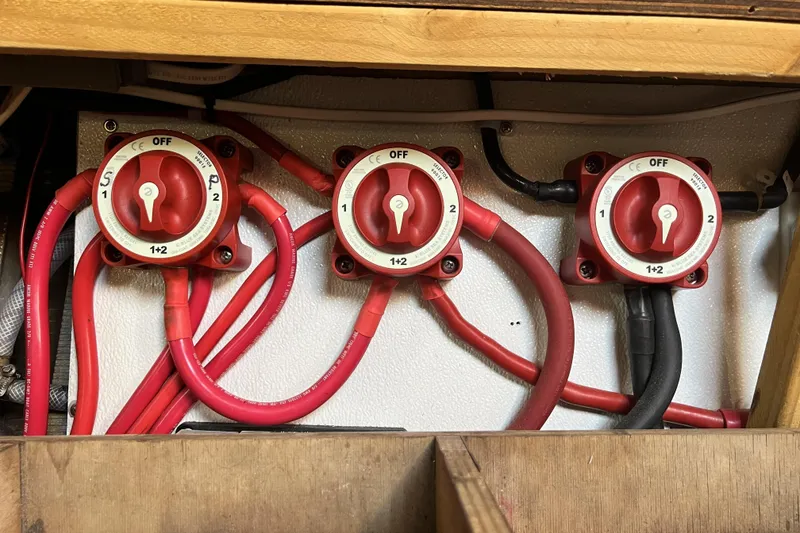 Slide: The Image of Red electrical switches with cables in a Pinical 14-34, 1985 model. - 6