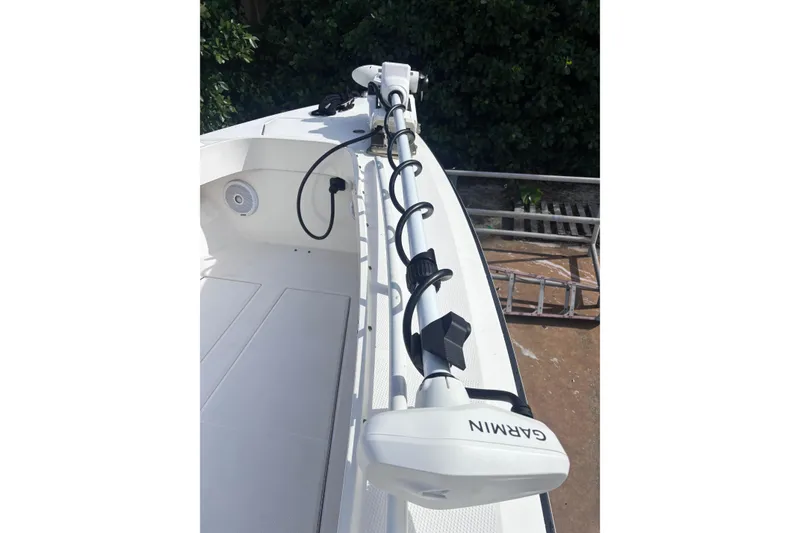 Slide: The Image of 2003 Island Runner 26 Center Console boat with Garmin equipment on deck. - 14