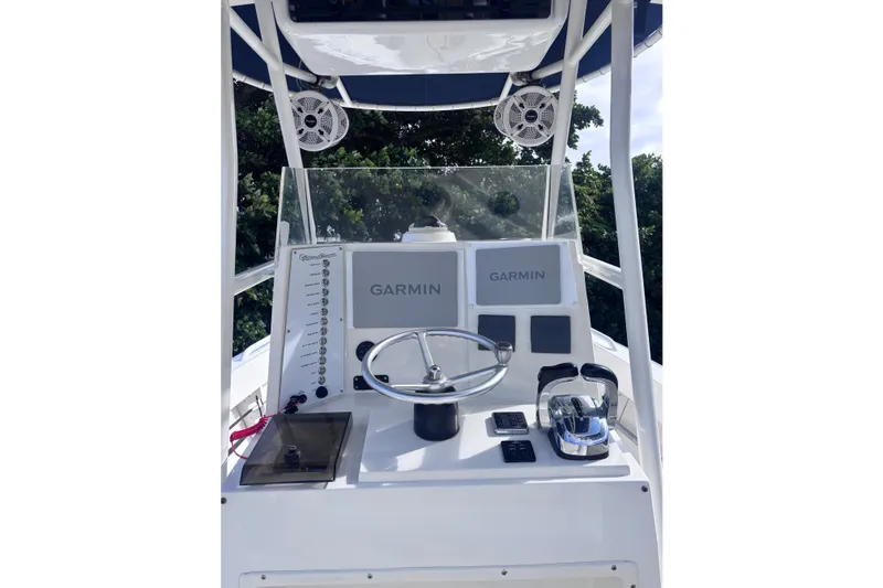 Slide: The Image of Center console of 2003 Island Runner 26 with Garmin navigation system. - 8