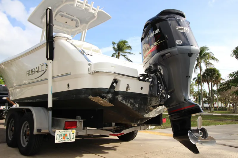 Slide: The Image of 2021 Robalo R230 Center Console boat on trailer with Yamaha 250 outboard motor. - 23