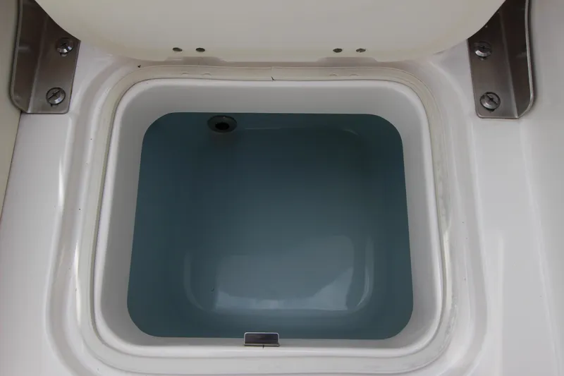 Slide: The Image of Livewell compartment on a 2021 Robalo R230 Center Console boat. - 46