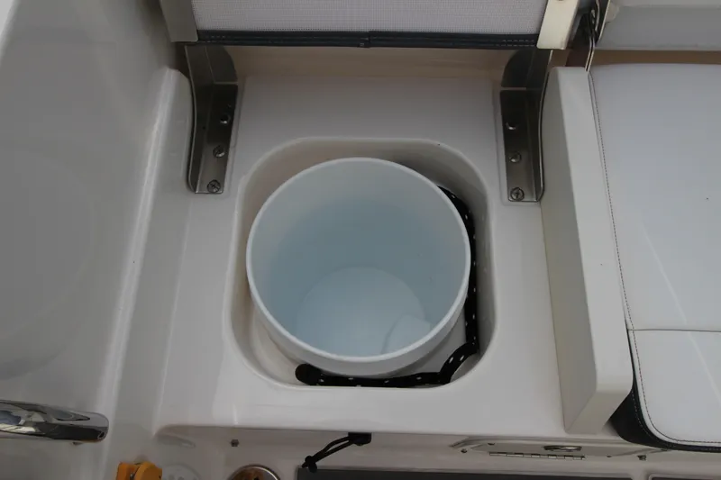 Slide: The Image of 2021 Robalo R230 Center Console boat with integrated storage compartment. - 47