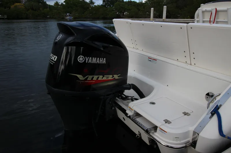 Slide: The Image of 2021 Robalo R230 Center Console with Yamaha VMAX outboard motor on water. - 62