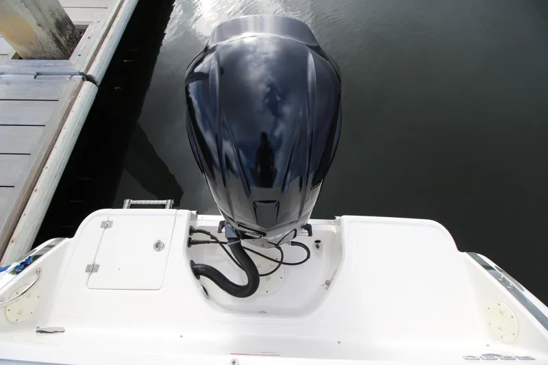 Slide: The Image of 2021 Robalo R230 Center Console boat engine at dockside view. - 64