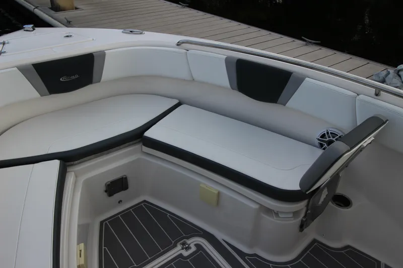 Slide: The Image of 2021 Robalo R230 Center Console boat interior with cushioned seating and sleek design. - 69