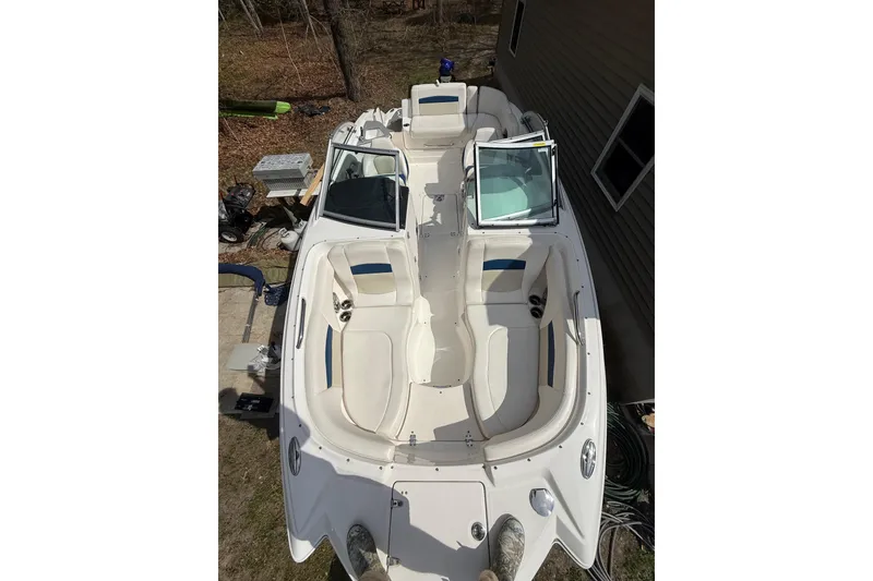Slide: The Image of 2016 Chaparral 224 Sunesta boat with open seating and sleek design, viewed from above. - 22