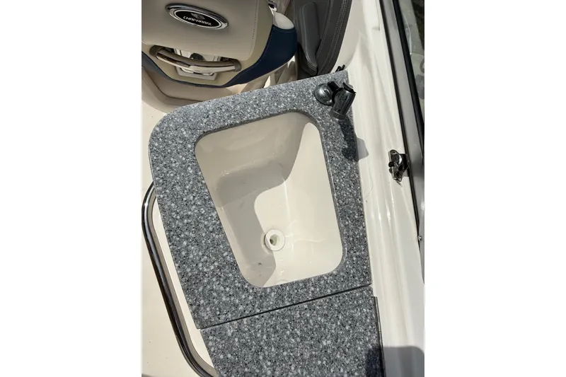 Slide: The Image of 2016 Chaparral 224 Sunesta boat sink with granite-style countertop. - 44