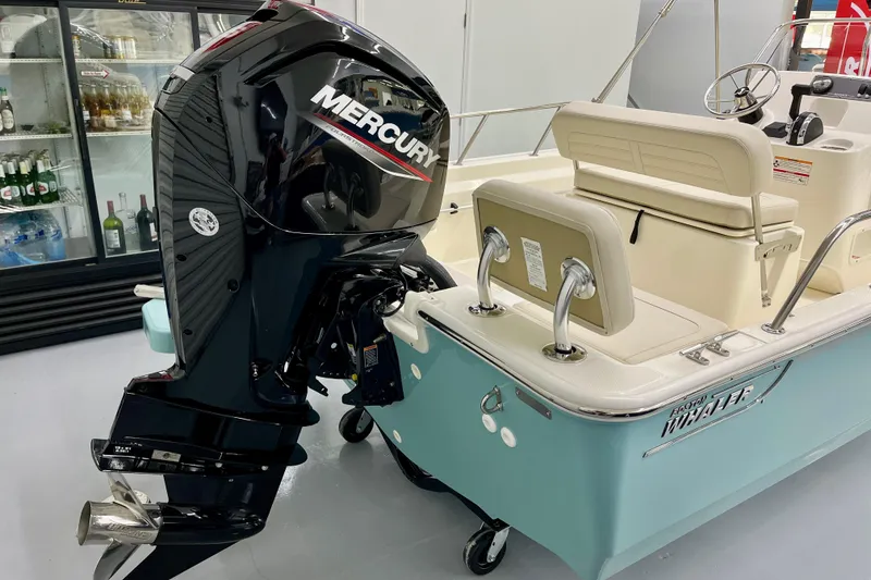 Slide: The Image of 2026 Boston Whaler 170 Montauk with Mercury outboard motor. - 2