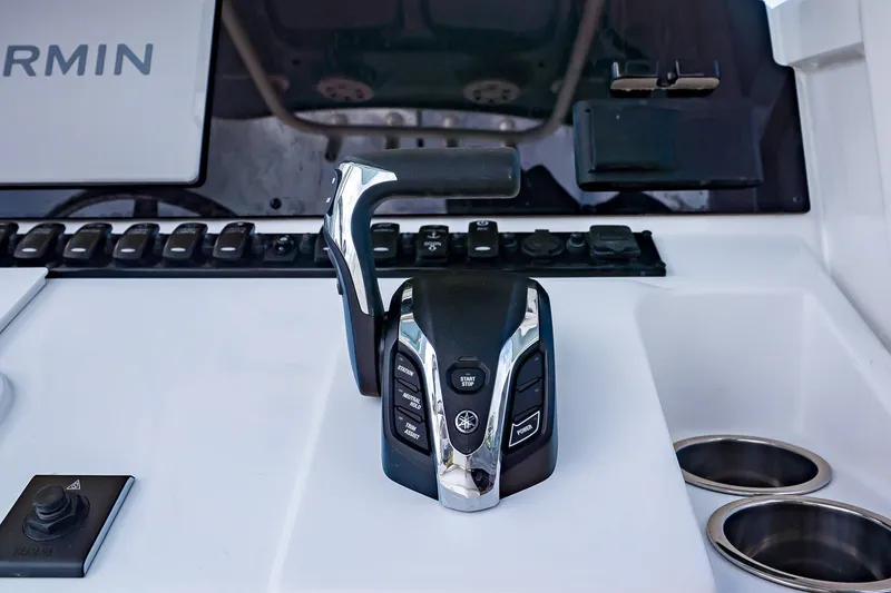 Slide: The Image of Control console of Sea Hunt Ultra 245 SE boat, year 2026. - 18