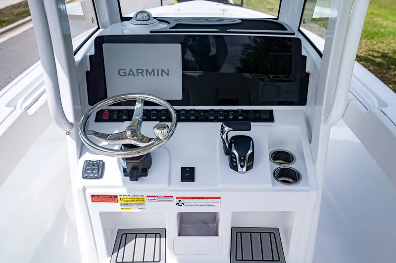 Slide: The Image of Sea Hunt Ultra 245 SE 2026 helm with Garmin navigation system. - 16