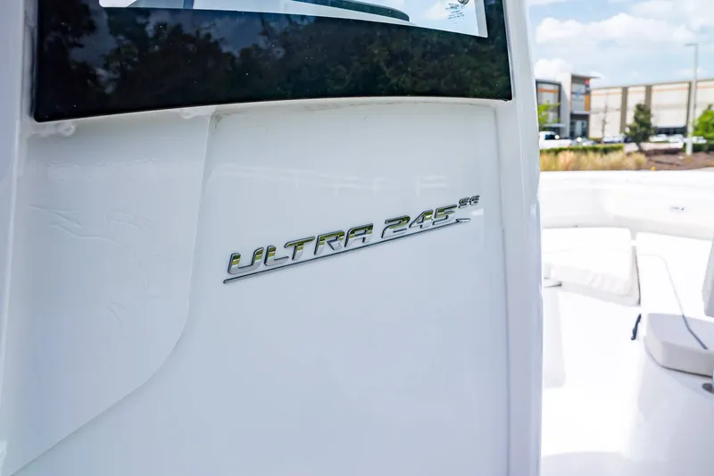 Slide: The Image of Sea Hunt Ultra 245 SE 2026 boat logo on white background. - 19