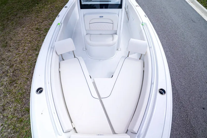 Slide: The Image of Interior view of Sea Hunt Ultra 245 SE boat, model year 2026. - 23