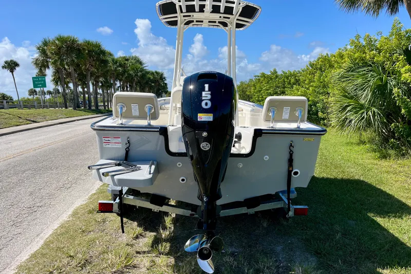 Slide: The Image of 2026 Boston Whaler 190 Montauk boat with outboard motor. - 3