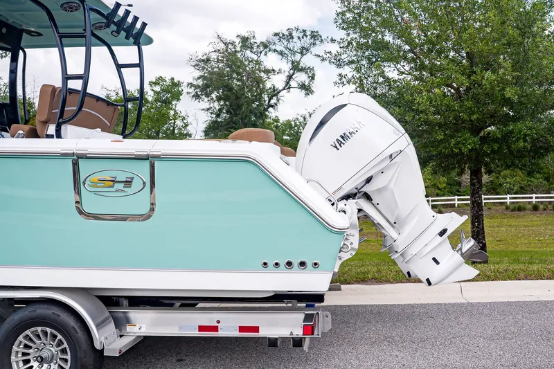 Slide: The Image of Sea Hunt ULTRA 285CB 2026 with Yamaha engine on trailer. - 3