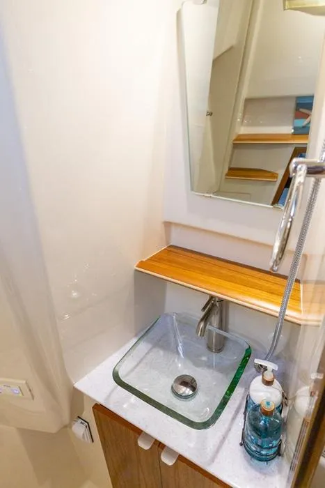 Slide: The Image of Modern bathroom sink in 2025 Ranger Tugs 43 Command Bridge yacht. - 37