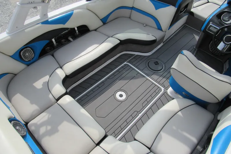 Slide: The Image of 2013 Malibu Wakesetter 20 VTX interior with gray and blue seating and modern design. - 7