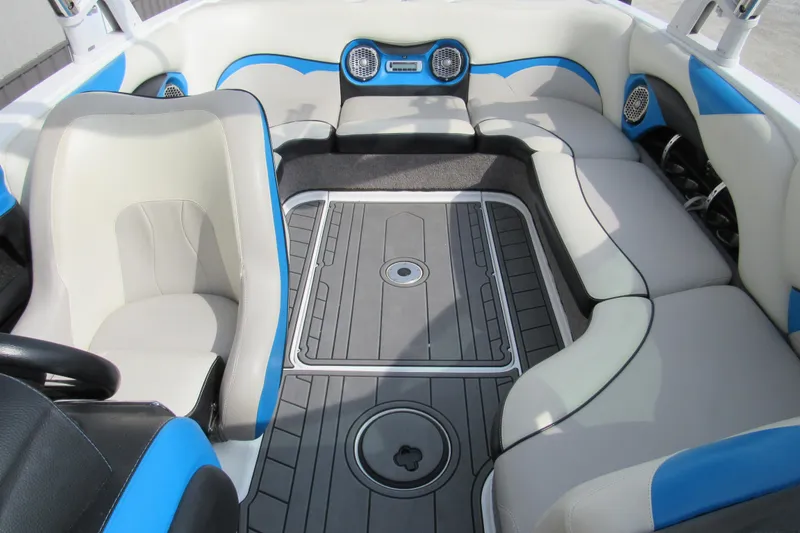 Slide: The Image of Interior of 2013 Malibu Wakesetter 21 VLX boat with stylish seating and speakers. - 10