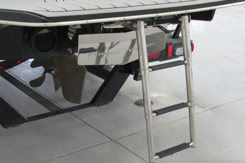 Slide: The Image of 2013 Malibu Wakesetter 21 VLX boat with ladder and propeller detail. - 13