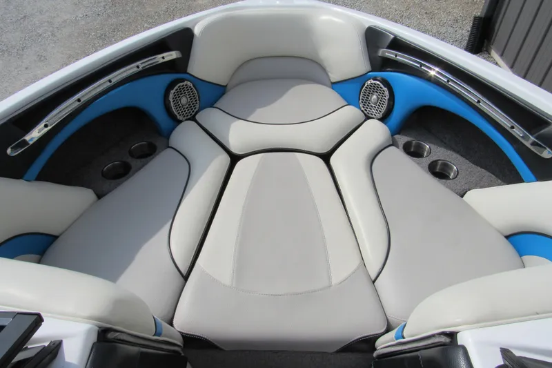 Slide: The Image of 2013 Malibu Wakesetter 21 VLX dashboard with modern controls and blue accents. - 9