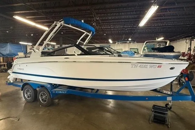 The Image of 2025 Cobalt CS22 boat on trailer in indoor storage facility. - 0