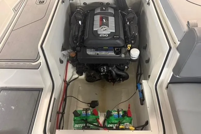 Slide: The Image of 2025 Cobalt CS22 boat engine compartment with Mercury 250 engine and dual batteries. - 17