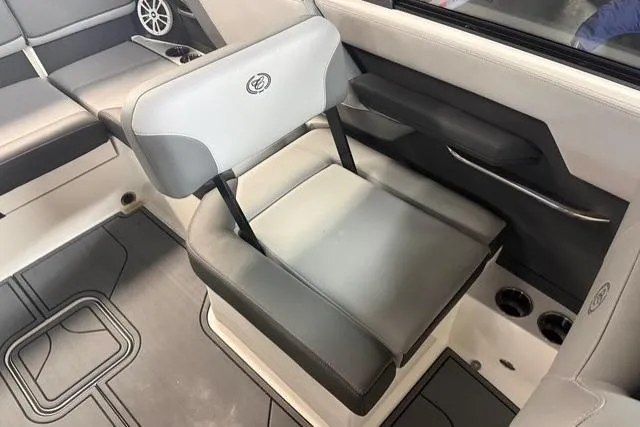 Slide: The Image of 2025 Cobalt CS22 boat interior with gray seating and modern design elements. - 6