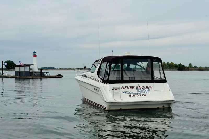 Slide: The Image of 1991 Sea Ray Sundancer 350 boat named "Never Enough" on water near Isleton, CA. - 5