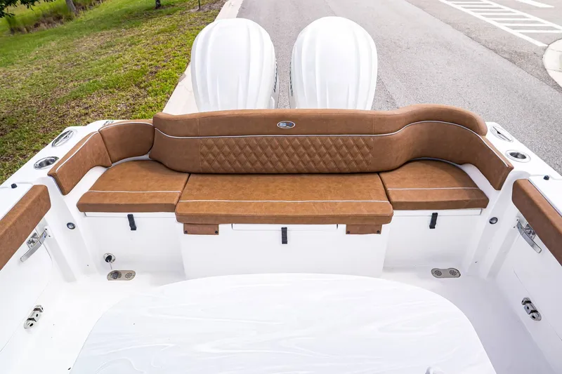 Slide: The Image of Rear seating of 2026 Sea Hunt ULTRA 285CB with brown upholstery. - 5