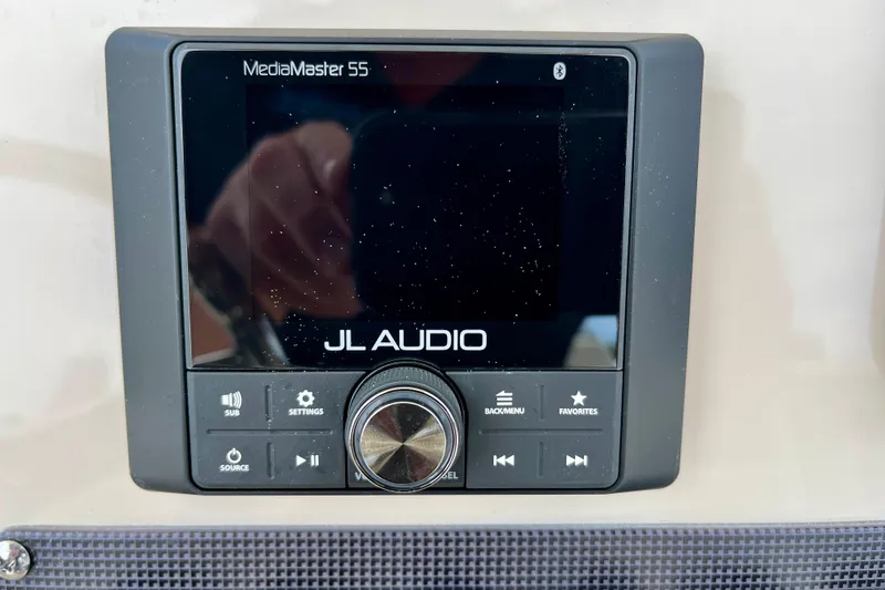 Slide: The Image of JL Audio MediaMaster 55 on Boston Whaler 220 Dauntless 2026. - 17